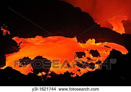 River of molten lava flowing to the sea at sunrise, Kilauea Volcano, Big Island, Hawaii Islands, USA View Large Photo Image Picture - River of molten lava flowing to the sea at sunrise, Kilauea Volcano, Big Island, Hawaii Islands, USA. Fotosearch