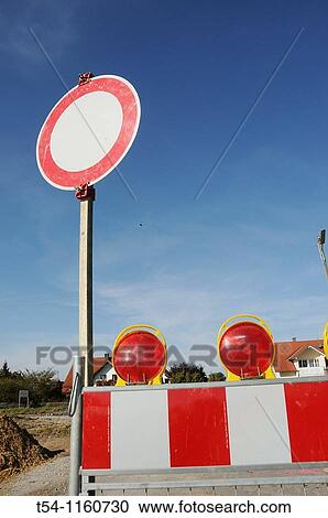 Stock Image - Road barrier due to construction. Fotosearch