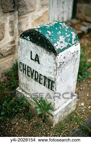 Road boundary La Chevrette in a street of Barbizon. Ile-de-France. Seine-et-Marne. France. Europe. View Large Photo Image Picture - Road boundary La Chevrette in a street of Barbizon. Ile-de-France. Seine-et-Marne. France. Europe.. Fotosearch