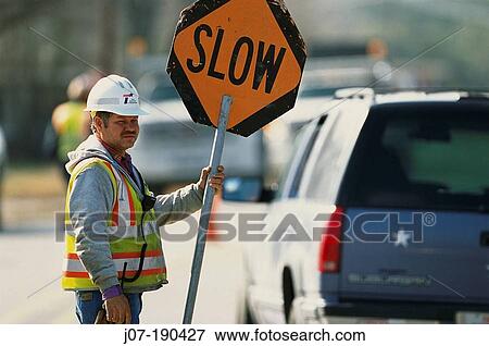 Road construction traffic worker. Texas. USA View Large Photo Image Stock Photo - Road construction traffic worker. Texas. USA. Fotosearch