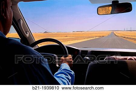 Road crossing the desert by Lake Nasser between Aswan and Abu Simbel, Egypt View Large Photo Image Stock Image - Road crossing the desert by Lake Nasser between Aswan and Abu Simbel, Egypt. Fotosearch