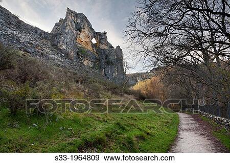 Stock Photo - Road in the river Dulce gorge in Pelegrina. Guadalajara. Castilla la Mancha. Spain.. Fotosearch
