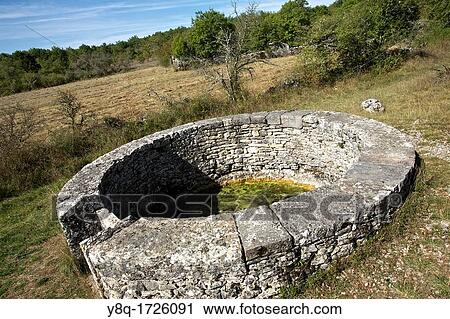 Road wells around bach, quercy white, GR65 way Compostela, France View Large Photo Image Stock Image - Road wells around bach, quercy white, GR65 way Compostela, France. Fotosearch