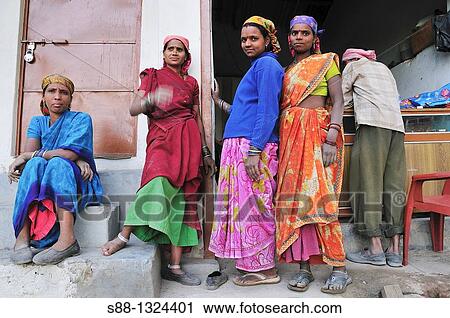 Stock Image - Road work women having rest. Fotosearch