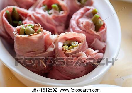 Stock Image - Roast Beef Rolls with Green beans. Fotosearch