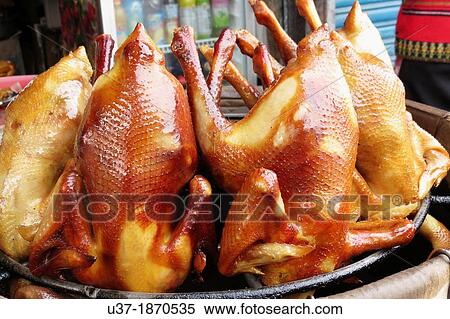 Stock Photography - Roasted chickens for sale, SunMoon Lake, Taiwan.. Fotosearch