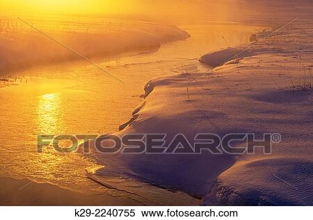 Stock Photography - Robinson Creek in mid winter at dawn, Greater Sudbury, Ontario, Canada.. Fotosearch