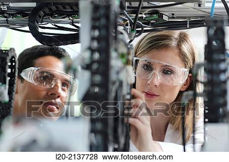 Stock Photo - Robotic cell manufacturing composite preforms. Dry fiber preform manufacturing 3D. Industry, Technology and Research Centre, Technological Park, San Sebastian, Donostia, Gipuzkoa, Basque Country, Spain. Fotosearch