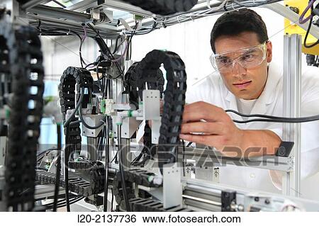 Robotic cell manufacturing composite preforms. Dry fiber preform manufacturing 3D. Industry, Technology and Research Centre, Technological Park, San Sebastian, Donostia, Gipuzkoa, Basque Country, Spain View Large Photo Image Stock Photograph - Robotic cell manufacturing composite preforms. Dry fiber preform manufacturing 3D. Industry, Technology and Research Centre, Technological Park, San Sebastian, Donostia, Gipuzkoa, Basque Country, Spain. Fotosearch