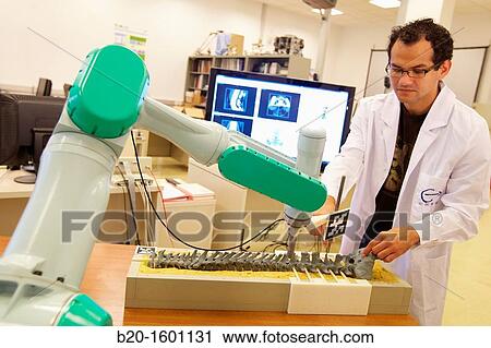 Robotic system to assist surgery View Large Photo Image Stock Image - Robotic system to assist surgery. Fotosearch