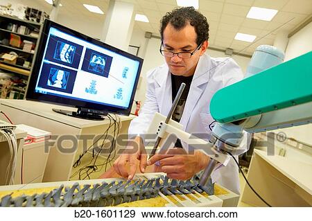 Robotic system to assist surgery View Large Photo Image Stock Photo - Robotic system to assist surgery. Fotosearch