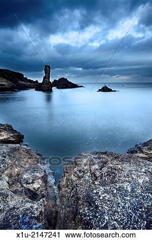 Stock Image - Rock and Spindle on the Fife Coast near St Andrews Fife Scotland.. Fotosearch
