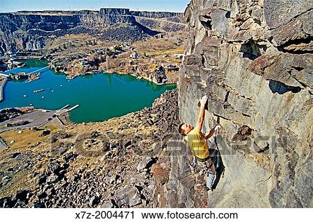 rock climbing a route called American Graffiti which is rated 5, 10 and located on The Prow above the Snake River at Dierkes Lake Park near the city of Twin Falls in southern Idaho. View Large Photo Image Stock Image - rock climbing a route called American Graffiti which is rated 5, 10 and located on The Prow above the Snake River at Dierkes Lake Park near the city of Twin Falls in southern Idaho.. Fotosearch