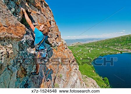 rock climbing a route called Angel Toes which is rated 5, 10 and located on The Angel Lake Crag above Angel Lake high in the East Humboldt Mountains of northern Nevada View Large Photo Image Stock Photo - rock climbing a route called Angel Toes which is rated 5, 10 and located on The Angel Lake Crag above Angel Lake high in the East Humboldt Mountains of northern Nevada. Fotosearch