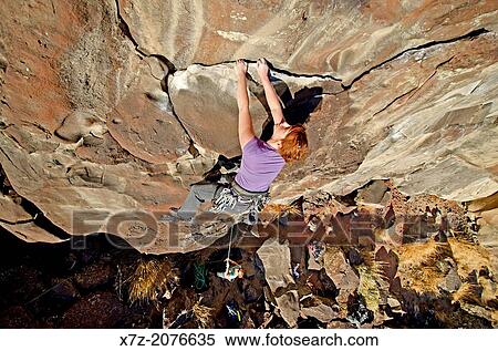 Stock Photography - Rock climbing a route called Casual Cruise which is rated 5, 10 and located on the North Shore at Dierkes Lake near the city of Twin Falls in southern Idaho.. Fotosearch