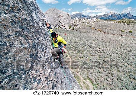 Rock climbing a route called Conceptual Reality which is rated 5, 9 and located on The Gallstone at The City Of Rocks National Reserve near the town of Almo in southern Idaho View Large Photo Image Stock Image - Rock climbing a route called Conceptual Reality which is rated 5, 9 and located on The Gallstone at The City Of Rocks National Reserve near the town of Almo in southern Idaho. Fotosearch