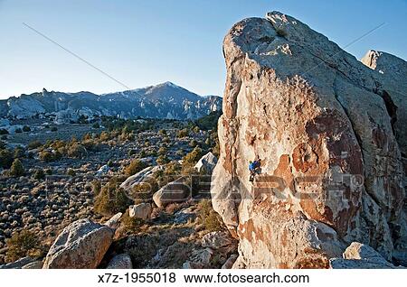 Rock climbing a route called Fido which is rated 5, 11 and located on the Electric Avenue formation at The City Of Rocks National Reserve near the town of Almo in southern Idaho. View Large Photo Image Stock Photo - Rock climbing a route called Fido which is rated 5, 11 and located on the Electric Avenue formation at The City Of Rocks National Reserve near the town of Almo in southern Idaho.. Fotosearch