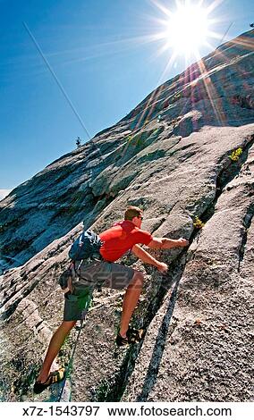 Rock climbing a route called Memorial which is rated 5, 8 and located on Slick Rock near the city of McCall in the Salmon River Mountains of central Idaho View Large Photo Image Stock Photo - Rock climbing a route called Memorial which is rated 5, 8 and located on Slick Rock near the city of McCall in the Salmon River Mountains of central Idaho. Fotosearch