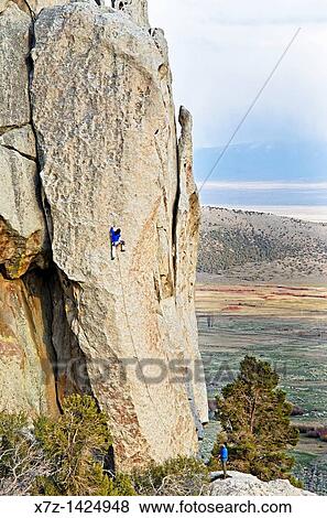 Stock Photo - Rock climbing a route called Sancho Rama which is rated 5, 10 and located on the Upper Comp Wall at Castle Rocks State Park near the town of Almo in southern Idaho. Fotosearch
