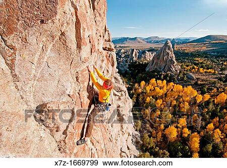 Rock climbing a route called Shes The Bosch which is rated 5, 11 and located on Window Rock at The City Of Rocks National Reserve near the town of Almo in southern Idaho View Large Photo Image Stock Photo - Rock climbing a route called Shes The Bosch which is rated 5, 11 and located on Window Rock at The City Of Rocks National Reserve near the town of Almo in southern Idaho. Fotosearch