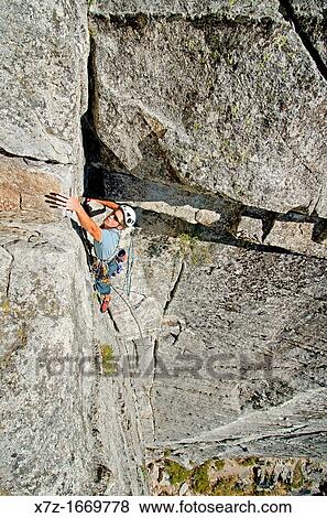 Rock climbing a route called Corrugation Corner which is rated 5, 7 and located at Lovers Leap near Lake Tahoe in northern California View Large Photo Image Stock Photo - Rock climbing a route called Corrugation Corner which is rated 5, 7 and located at Lovers Leap near Lake Tahoe in northern California. Fotosearch