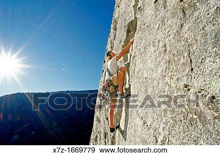 Rock climbing a route called Corrugation Corner which is rated 5, 7 and located at Lovers Leap near Lake Tahoe in northern California View Large Photo Image Stock Photo - Rock climbing a route called Corrugation Corner which is rated 5, 7 and located at Lovers Leap near Lake Tahoe in northern California. Fotosearch