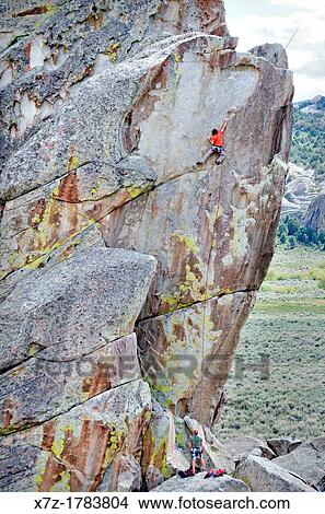 rock climbing a route called Techno Weenie which is rated 5, 11 and located on the Building Blocks at The City Of Rocks National Reserve near the town of Almo in southern Idaho View Large Photo Image Picture - rock climbing a route called Techno Weenie which is rated 5, 11 and located on the Building Blocks at The City Of Rocks National Reserve near the town of Almo in southern Idaho. Fotosearch