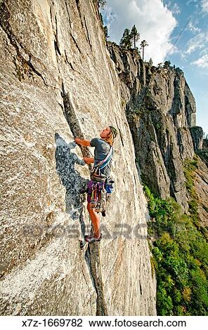 Rock climbing a route called The Line which is rated 5, 9 and located at Lovers Leap near Lake Tahoe in northern California View Large Photo Image Stock Image - Rock climbing a route called The Line which is rated 5, 9 and located at Lovers Leap near Lake Tahoe in northern California. Fotosearch