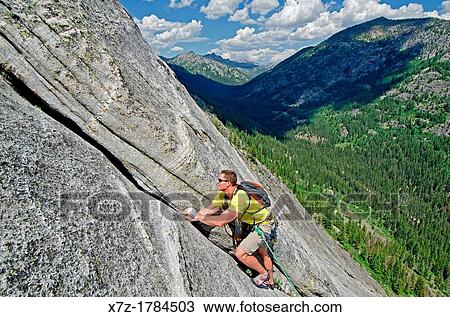rock climbing a route called the Regular Route which is rated 5, 6 and located on Slick Rock near the city of McCall in the Salmon River Mountains of central Idaho View Large Photo Image Stock Image - rock climbing a route called the Regular Route which is rated 5, 6 and located on Slick Rock near the city of McCall in the Salmon River Mountains of central Idaho. Fotosearch