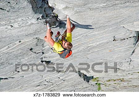 rock climbing a route called the Regular Route which is rated 5, 6 and located on Slick Rock near the city of McCall in the Salmon River Mountains of central Idaho View Large Photo Image Stock Photo - rock climbing a route called the Regular Route which is rated 5, 6 and located on Slick Rock near the city of McCall in the Salmon River Mountains of central Idaho. Fotosearch