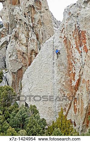 Rock climbing a route called True Grit which is rated 5, 9 and located on the True Grit formation at Castle Rocks State Park near the town of Almo in southern Idaho View Large Photo Image Picture - Rock climbing a route called True Grit which is rated 5, 9 and located on the True Grit formation at Castle Rocks State Park near the town of Almo in southern Idaho. Fotosearch