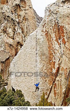 Rock climbing a route called True Grit which is rated 5, 9 and located on the True Grit formation at Castle Rocks State Park near the town of Almo in southern Idaho View Large Photo Image Stock Photo - Rock climbing a route called True Grit which is rated 5, 9 and located on the True Grit formation at Castle Rocks State Park near the town of Almo in southern Idaho. Fotosearch