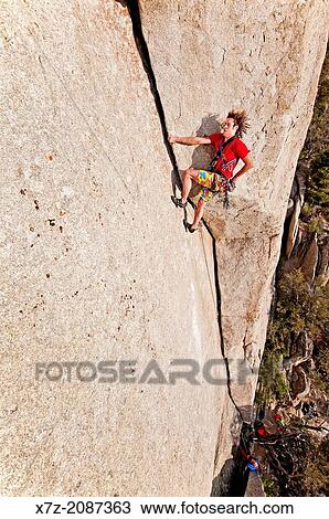 Rock climbing a route called White Lightning which is rated 5, 10 and located at The City Of Rocks National Reserve near the town of Almo in southern Idaho. View Large Photo Image Stock Image - Rock climbing a route called White Lightning which is rated 5, 10 and located at The City Of Rocks National Reserve near the town of Almo in southern Idaho.. Fotosearch