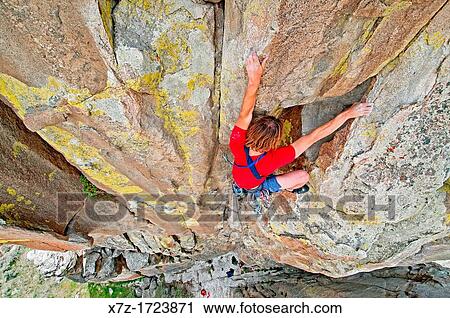 rock climbing a route called Yellow Wall which is rated 5, 9 and located on The Yellow Wall at The City Of Rocks National Reserve near the town of Almo in southern Idaho View Large Photo Image Stock Image - rock climbing a route called Yellow Wall which is rated 5, 9 and located on The Yellow Wall at The City Of Rocks National Reserve near the town of Almo in southern Idaho. Fotosearch