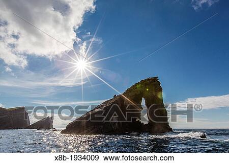 Stock Photo - Rock formation known as Gada's Stack on Foula Island, Shetlands, Scotland.. Fotosearch