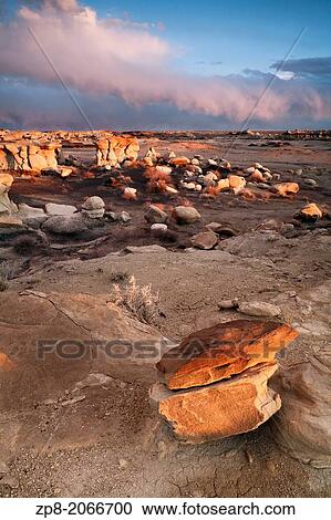 Stock Image - Rock formations and Hoodoos in the Bisti/De-Na-Zin Wilderness, New Mexico, USA.. Fotosearch
