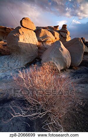 Stock Photo - Rock formations and Hoodoos in the Bisti/De-Na-Zin Wilderness, New Mexico, USA.. Fotosearch