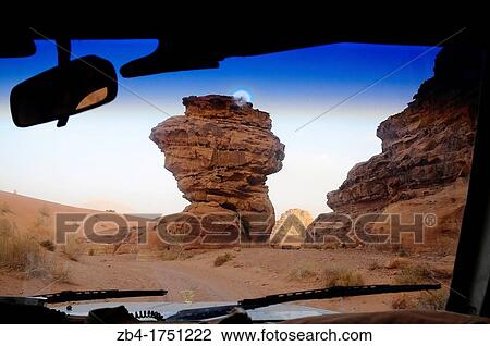 Rock formations from a car front window, Wadi Rum desert, Jordan, Middle East. View Large Photo Image Stock Image - Rock formations from a car front window, Wadi Rum desert, Jordan, Middle East.. Fotosearch