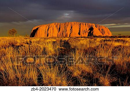 Rock formations on landscape, Uluru, Uluru-Kata Tjuta National Park, Northern Territory, Australia, Oceania. View Large Photo Image Stock Image - Rock formations on landscape, Uluru, Uluru-Kata Tjuta National Park, Northern Territory, Australia, Oceania.. Fotosearch