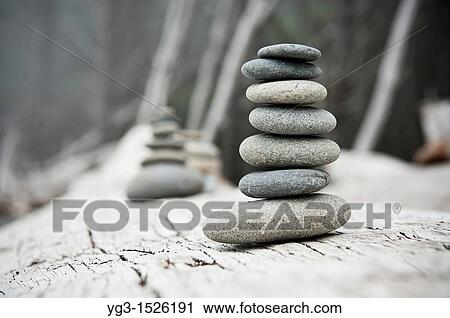 Rock pile on driftwood, Rialto Beach, Olympic national park, Washington, USA View Large Photo Image Stock Image - Rock pile on driftwood, Rialto Beach, Olympic national park, Washington, USA. Fotosearch