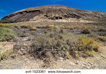 Rock volcanic Formations at the base of Montaa de Guenia Lanzarote, Canary Islands, Spain View Large Photo Image Stock Image - Rock volcanic Formations at the base of Montaa de Guenia Lanzarote, Canary Islands, Spain. Fotosearch