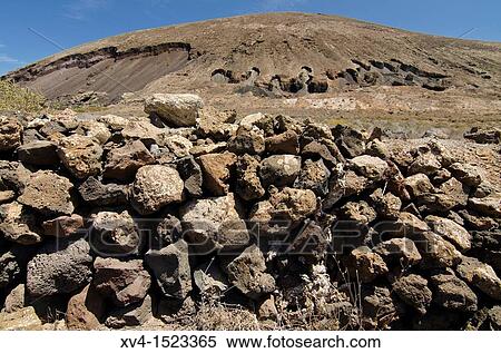 Rock volcanic Formations at the base of Montaa de Guenia Lanzarote, Canary Islands, Spain View Large Photo Image Stock Photography - Rock volcanic Formations at the base of Montaa de Guenia Lanzarote, Canary Islands, Spain. Fotosearch