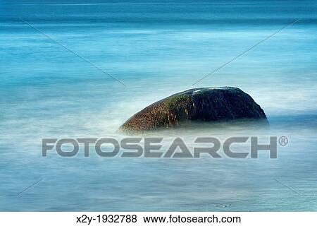 Rock with moving ocean water, Martha's Vineyard, USA View Large Photo Image Stock Photo - Rock with moving ocean water, Martha's Vineyard, USA. Fotosearch