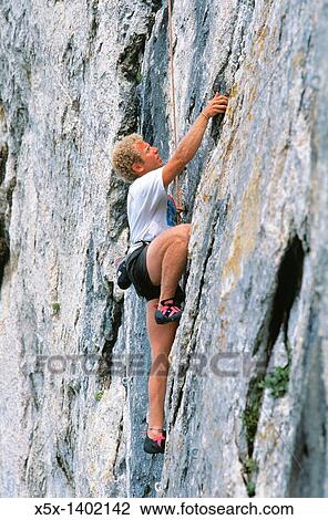 Rockclimber at Les Dentelles de Montmirail in Provence, France View Large Photo Image Stock Image - Rockclimber at Les Dentelles de Montmirail in Provence, France. Fotosearch