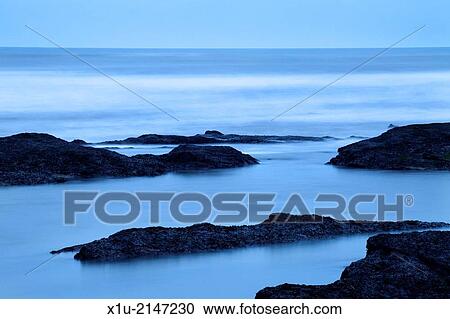Rocks and Sea at Dusk St Andrews Fife Scotland. View Large Photo Image Stock Image - Rocks and Sea at Dusk St Andrews Fife Scotland.. Fotosearch