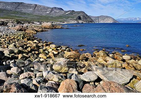 Stock Photo - rocky beach at Saglek Fjord, Torngat Mountains National Park, Newfoundland and Labrador, Canada. Fotosearch