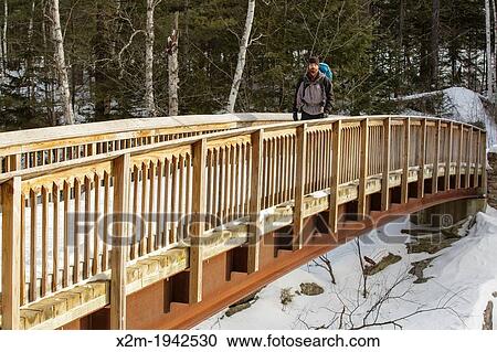 Rocky Gorge Scenic Area - The Rocky Gorge Bridge which crosses the Swift River in the White Mountains, New Hampshire USA during the winter months. View Large Photo Image Stock Image - Rocky Gorge Scenic Area - The Rocky Gorge Bridge which crosses the Swift River in the White Mountains, New Hampshire USA during the winter months.. Fotosearch