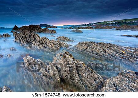 Rocky shores of Bantham at Dusk, Bantham, South Devon, England, United Kingdom, Europe View Large Photo Image Stock Photo - Rocky shores of Bantham at Dusk, Bantham, South Devon, England, United Kingdom, Europe. Fotosearch
