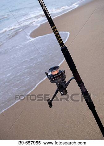Rod and Reel on the Beach in Kill Devil Hills, NC, USA. View Large Photo Image Stock Photography - Rod and Reel on the Beach in Kill Devil Hills, NC, USA.. Fotosearch