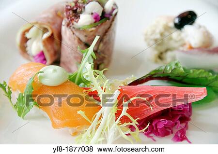 Rolled ham stuffed with salad and salmon fume View Large Photo Image Stock Photo - Rolled ham stuffed with salad and salmon fume. Fotosearch